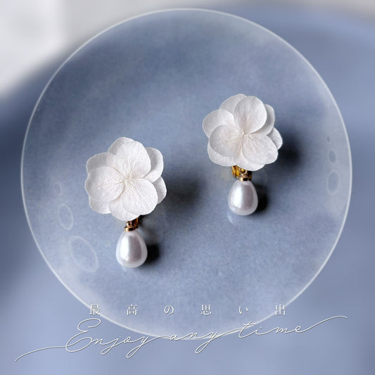 Bijoux mariage perle fleurs stabilisées clips mariée chic intemporel