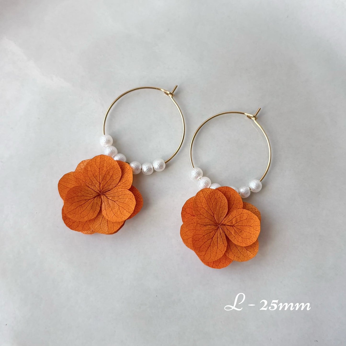 boucles d’oreilles mariage en fleurs stabilisées orange terracotta pour mariée bohème chic