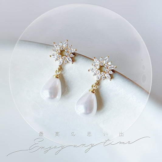 Bijou de mariage élégant avec clous d’oreilles en forme de fleur et perle goutte