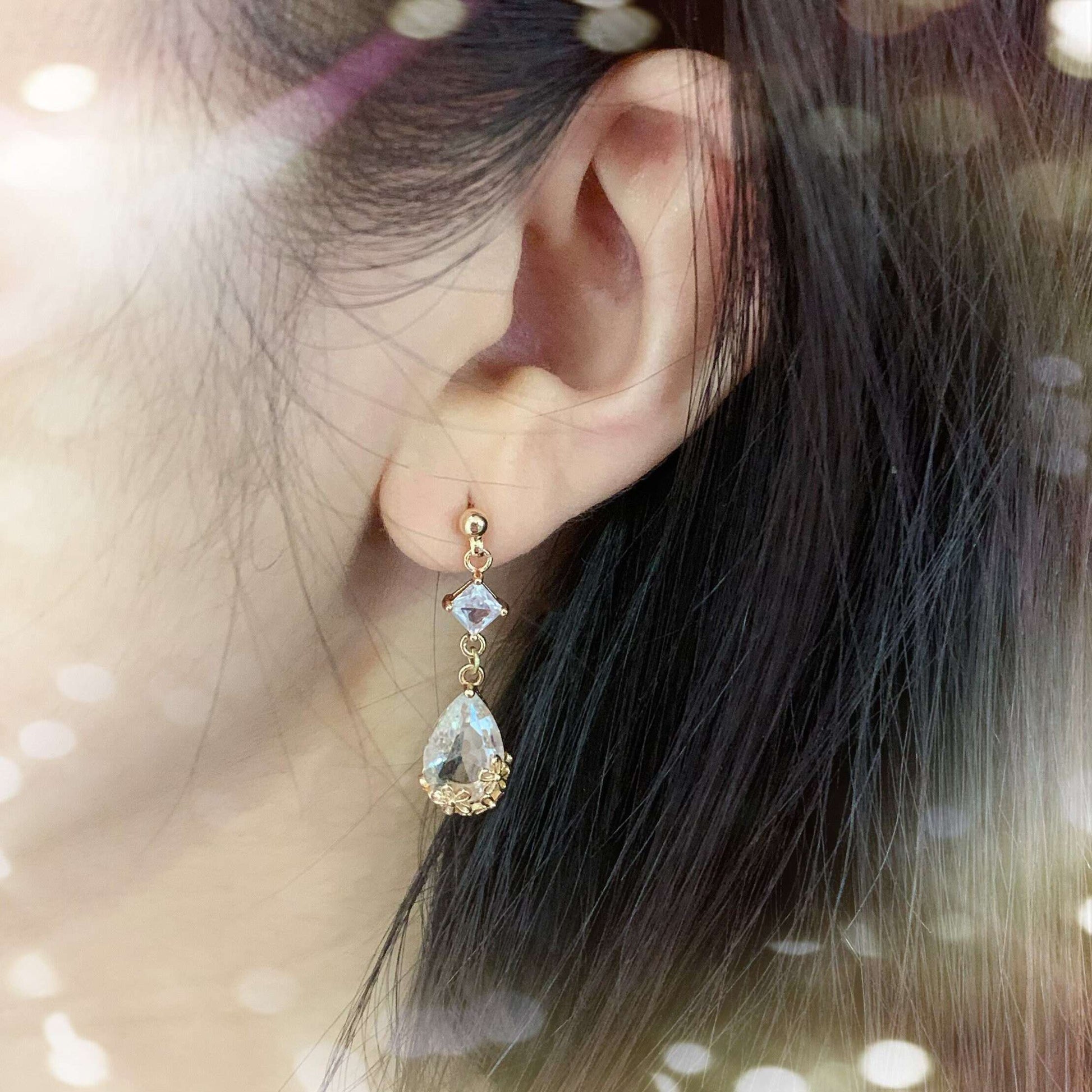 Boucles d’oreilles élégantes pour mariage avec détail floral en verre