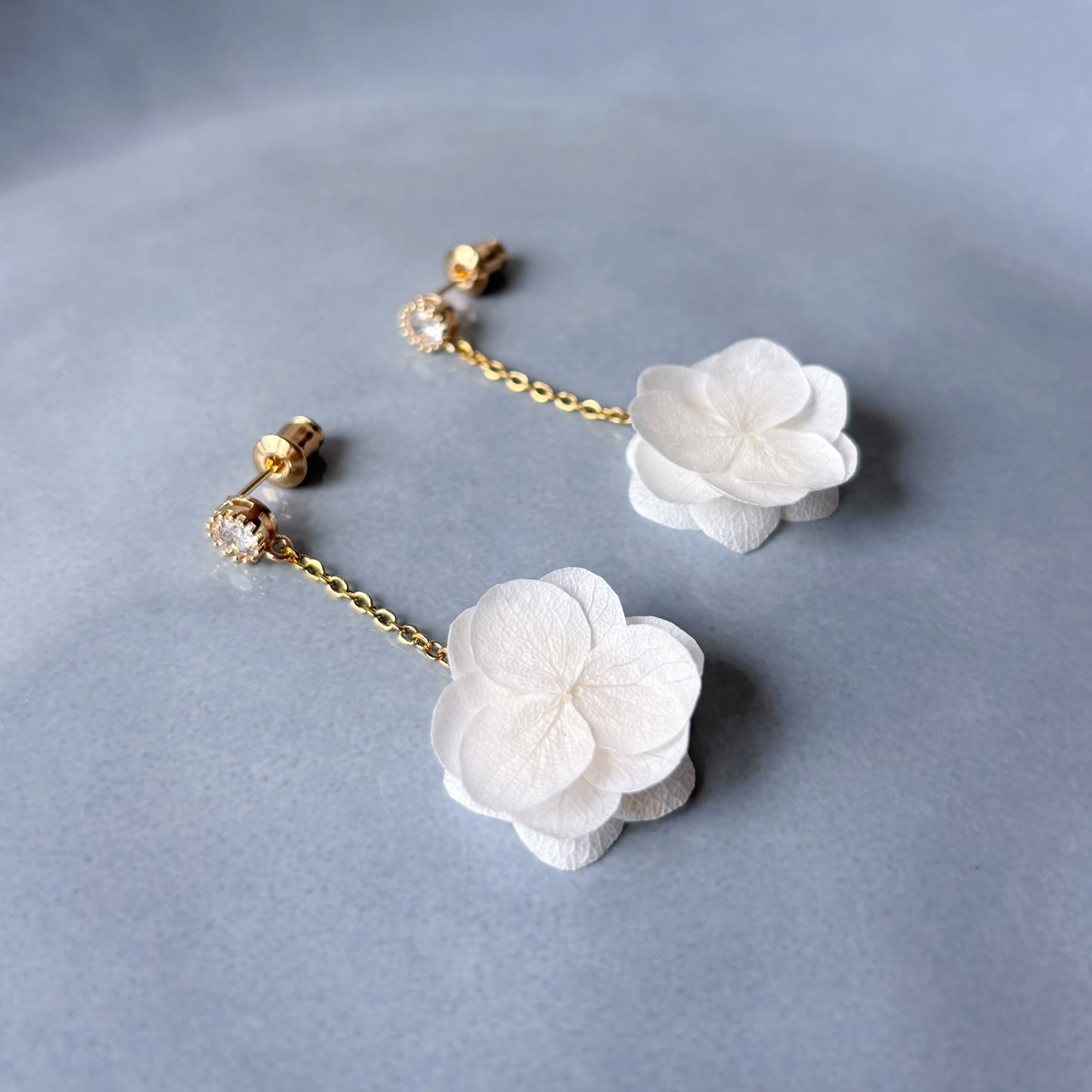 Bijoux mariage fleurs stabilisées pendantes parure mariée zircon